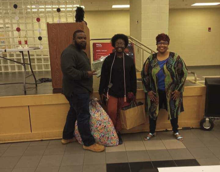 Dorm Essential Scholarship 2 A senior receives a dorm essential scholarship, which includes items for college such as a bed, laundry supplies, a microwave and other dorm room items.