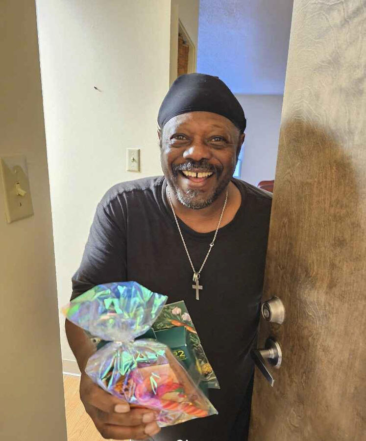 Audubon Pointe 1 Resident from Audubon Pointe recieves a Christmas package.